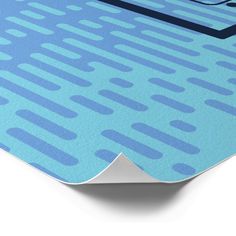 a close up view of the top of a table with blue and black dots on it