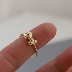 This chic and minimal ring stacks perfectly with others or makes a statement on its own. It is a great gift for birthdays, Valentine's day, or any special occasion. Materials & Specifications:- 14K gold- Available in 3 options: Yellow Gold, White Gold, and Rose Gold - Horse dimensions are 1.1cm x 7.7mmPlease note that all of our rose gold and white gold items are made with real rose and white gold. We do not plate any of our gold items. As with all of our products, this item is handmade and made Evil Eye Ring Gold, Ring Stacks, Gold Items, Country Jewelry, Preppy Jewelry, Pretty Jewelry Necklaces, Equestrian Jewelry, Looks Country