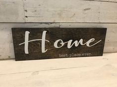 a wooden sign that says, home best place ever