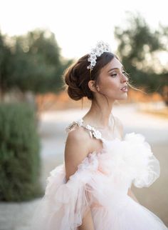 A breathtaking floral crown featuring clay flowers that were hand sculpted in our studio, and set with sparkly Austrian crystals. This crown is extra special and would be the perfect statement piece to any bridal look Adorned portion measures approximately 9 inches at its longest by 2 1/2 inches at its widest Austrian crystals Clay flowers are handmade in our studio Wired to a gold plated headband Available in off white/brass as pictured Flower Tiara, Wedding Girl, Fascinator Headband, Wedding Fascinators, Hair Adornments, White Brass, Bridal Look, Clay Flowers, Wedding Hats