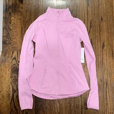 Brand New With Tags. Super Buttery Soft Material Perfect For Wearing To Yoga Class Or On A Run. Beautiful Light Pink Color. Sporty Fitted Long Sleeve Outerwear, Fitted Long Sleeve Sporty Outerwear, Spring Athleisure Long Sleeve Outerwear, Spring Sports Fitted Outerwear, Fitted Long Sleeve Track Jacket For Winter, Fitted Long Sleeve Athleisure Outerwear, Pink Athleisure Outerwear With Long Sleeves, Pink Fitted Track Jacket For Sports, Pink Fitted Track Jacket For Fall