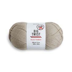 a ball of yarn that is white and has the words big twist written on it