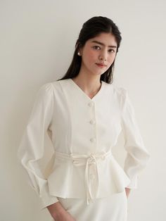 Composition : POLYESTER 58 COTTON 40 SPAN 2Color : WHITE Country of Origin : KOREA Spring Office Blouse In White, Spring White Office Blouse, Elegant Winter White Workwear Tops, Elegant Winter White Tops For Workwear, Elegant Off-white Tops For Work, Classic Winter White Tops For Workwear, Elegant White Tops For Workwear, White V-neck Blouse For Work, Elegant White Tops For Work