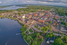 an aerial view of a large city by the water