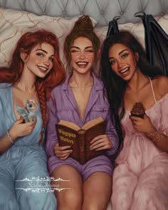 three beautiful women laying on top of a bed next to each other holding an open book