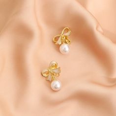 "A symbol of happiness and beauty. We offer a variety of styles to suit your daily needs and preferences. Wearing these dainty bow earrings will keep happiness and beauty by your side." Pearl Bow, Birthday Jewelry, Stud Earrings For Women, Bow Earrings, Birthday Jewelry Gift, Silver Stud Earrings, Holiday Birthday, Silver Earrings Studs, Silver Studs