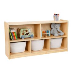 a wooden shelf with baskets and toys on it