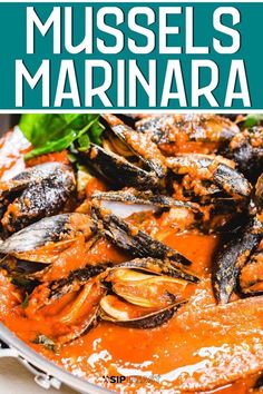 mussels marinara in a white bowl on a table