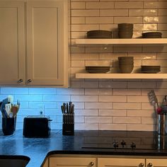 the kitchen counter is clean and ready to be used for dinner or other meal preparation