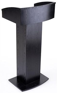 a black wooden podium with a white background