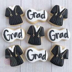 decorated cookies that say grad and graduation