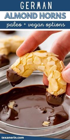 a person dipping some kind of food into chocolate