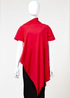 Asymmetrical t shirt in soft cotton jersey. dramatic draping hangs longer on one side. raw hem and draped asymmetrical collar.    - one size fits most.  - model is 1.76m tall (5'9.5") and wears size small.  - 100% organic cotton.  hand wash.  - made in canada. Asymmetrical Collar, Open Neck, Knit Top, Sleeveless Dress, Tunic Tops, Short Sleeve Dresses, Organic Cotton, Hand Wash, Thing 1