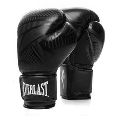 a black boxing glove with the word ferllast on it's side