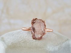 LOTUS - Raw Rose Quartz ring Candid and effortless elegance, delicate and intense at the same time. Symbol of love and beauty, Rose Quartz is the perfect gift for yourself or for your beloved half. DETAILS *Raw AAA grade Rose Quartz *Pure copper base with plating options The ring you will receive will be very similar to the one showed in the photos. Though I do my very best to make them 100% identical, due to the raw nature of the stone and the totally handcrafted working process, each piece wil Elegant Raw Stone Jewelry For Anniversary, Elegant Raw Stone Gift Rings, Fine Jewelry Crystal Ring With Si Clarity For Wedding, Fine Jewelry Si Clarity Crystal Wedding Ring, Delicate Crystal Gemstone Ring For Wedding, Elegant Ring With Raw Stone, Elegant Raw Stone Rings For Anniversary, Delicate Wedding Crystal Ring With Gemstone, Elegant Raw Stone Wedding Rings