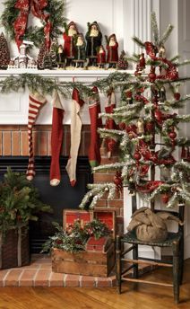 a fireplace decorated for christmas with stockings and stockings hanging from the mantle