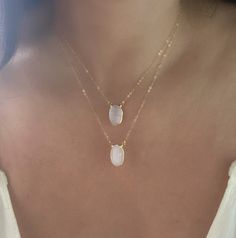 "Oval Selenite Pendant Necklace✨🤍 24k gold plated just around the edges so you can soak in the beautiful energy through your skin. Chains is 16-18\" adjustable gold fill. Each selenite piece is unique just like all gemstones and may vary in shades of white and translucency. All stones are hand chosen and handmade✨ Selenite it the \"sage\" of crystals and will cleanse and clear your aura and keep negative energy away ✨ This is a must have stone and what better way to carry it with you than on a Selenite Jewelry, Selenite Necklace, Beautiful Energy, Black Onyx Necklace, Oval Necklace, Stretch Band, Gold Heart Necklace, Shades Of White, Venice Beach