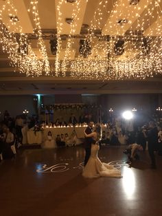 Twinkle Lights Dance Floor, Party Room Wedding, Lights From Ceiling Wedding, Wedding Light Decorations Indoor, White And Fairy Lights Wedding, Indoor Lights Wedding, Hanging Lights Indoor Wedding, Indoor Wedding Reception Decorations Hanging Lights, Twinkle Lights At Wedding