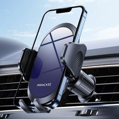 an image of a car phone holder attached to the dash board and in the air