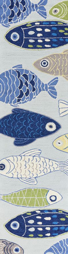 an area rug with fish on it in blue, green and yellow colors is shown