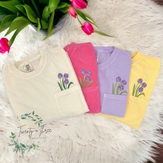 These embroidered floral pocket tees make the perfect Spring/Summer shirts! Check out our page for these shirts in more colors! if you don't see a color you want please message and we can discuss other options.  **shirt colors may vary slightly from shirt to shirt depending on dye. please use the color chart in the last picture for a truer color** ORDERING & SHIPPING *Your item will be shipped within 5-7 business days. *Please allow 2-5 business days to receive your item, more time may be necess Spring T-shirt With Pockets And Relaxed Fit, Spring Relaxed Fit T-shirt With Pockets, Relaxed Fit T-shirt With Pockets For Spring, Tulips Color, Embroidered Wildflowers, Embroidered Tulips, Tulip Colors, T-shirt Broderie, Spring Clothing