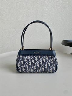 Luxury Classic Shoulder Bag For Summer, Luxury Shoulder Bag For Summer, Luxury Navy Shoulder Bag For On-the-go, Luxury Navy Shoulder Bag, Luxury Everyday Navy Shoulder Bag, Trendy Luxury Blue Shoulder Bag, Trendy Blue Luxury Shoulder Bag, Luxury Blue Casual Shoulder Bag, Luxury Feminine Shoulder Bag