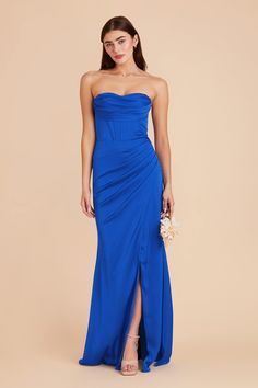 a woman in a blue strapless bridesmaid dress with high slit and side slit