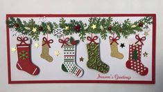 a christmas card with stockings and stockings on it