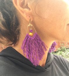 purple tassel, lightweight, perfect everyday earrings. They are made with gold (nickel free) fishhook ear wires, czech glass turquoise gold seed beads, orange wood beads, & purple crackle glass beads. Measures 4 inches from the top of the ear wire to the bottom. Translucent, soft rubber earring backs are included. Please take a few moments to browse through my shop. I have a large selection of unique belt buckles, leather belt straps, jewelry, beaded key chains, and other unique items. Order Beaded Key Chains, Orange Wood, Silver Belt Buckle, Orange Earrings, Purple And Orange, Earrings Purple, Jewelry Beaded, Earrings Bohemian, Crackle Glass