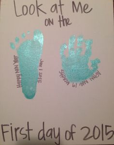 a hand and foot prints on a white paper with the words, look at me on the first day of 2013