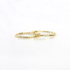 Prasanna Ring Delicate Gold Stackable Rings, Tarnish Resistant, Delicate Gold Tarnish Resistant Stackable Rings, Gold Stackable Wedding Rings From Recycled Gold, Delicate Gold 14k Band, Elegant Hammered Rings For Anniversary, Delicate 14k Gold Band, Elegant Adjustable Stackable Rings In Recycled Gold, Elegant Hammered Rings, Minimalist Hammered Rings For Formal Occasions