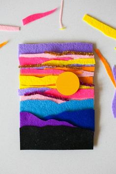 an art project made out of felt and colored paper