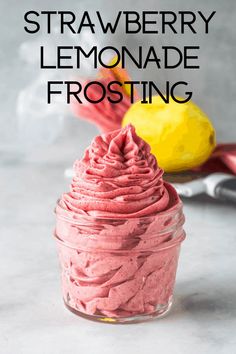 strawberry lemonade frosting in a glass jar with the title overlay reads, strawberry lemonade frosting