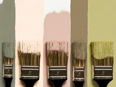 three paintbrushes with different shades of pink and grey on them, one is black