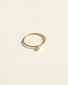 Featuring a dainty stacking ring with a tiny crystal pearl in the center of the ring. Made in 14k gold-fill, she's tarnish-resistant, showerproof, and safe for sensitive skin. Just keep her away from chemicals such as hand sanitizer, soap, and lotion. She looks beautiful stacked or as a solo ring. …………………………………. D E T A I L S • Available from US 5 to 7• Pearl width measures 3mm• Keep away from chemicals such as lotion, soap, and hand sanitizer• Tarnish-resistant, waterproof, and safe for sensiti Pearl Stacking Ring, Soft Toothbrush, Crystal Pearls, Stacking Ring, Gold Filled Jewelry, Gold Plated Jewelry, Stacking Rings, Jewelry Plate, Hand Sanitizer