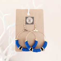 These gorgeous gold, blue and black Heishi hoop earrings are made from brightly coloured polymer clay, perfect for adding pops of colour to any outfit! Perfect for a beach holiday or festival! Hoops and earring hooks are made from plated gold or plated silver.  Each pair of earrings has been handmade by Mizzle & Tink. Should you want a certain colour way or order of colours, please do get in touch as I can always make a bespoke pair! Earrings are packaged in a smart black earring box, like the o Handmade Blue Heishi Beads Earrings, Trendy Blue Heishi Beads Jewelry, Adjustable Blue Polymer Clay Jewelry, Earrings Polymer Clay, Clay Bead Earrings, Diy Jewellery Designs, Diy Jewelry Making Tutorials, Blue Clay, Diy Jewelry Projects