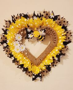 Ribbon and nautical rope on a heart frame. Add some daisies and a cute bee to finish the look. Bee Heart, Heart Shaped Wreath, Heart Shaped Wreaths