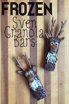 two frozen cranberry granola bars with reindeer heads on them