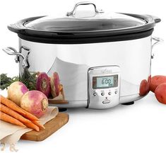 an electric pressure cooker with vegetables on the counter