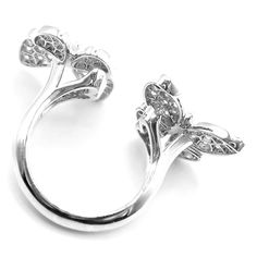 Van Cleef & Arpels 18k White Gold Diamond Two Butterfly Between Finger Ring  Metal: 18k White Gold  Size: European 52, US 6  Weight: 9.2 grams  Width; 20mm  Stones: 70 round brilliant cut diamond VVS1 clarity, E color total weight 1.67ct  Hallmarks: Cartier 750 52 JA19XXX (Serial Omitted) T3352ooled  Dimensions reference the ring size and are not specific to the ring itself. Luxury Cubic Zirconia Butterfly Ring, Luxury Butterfly Ring With Cubic Zirconia, Luxury Butterfly Ring For Formal Occasions, Luxury White Gold Butterfly Ring With Cubic Zirconia, Luxury Silver Butterfly Ring With Diamond Accents, Luxury Silver Diamond Butterfly Ring, Luxury Diamond Butterfly Ring For Formal Occasions, Luxury Butterfly Ring With Diamond Accents For Formal Occasions, Luxury Formal Butterfly Ring With Diamond Accents