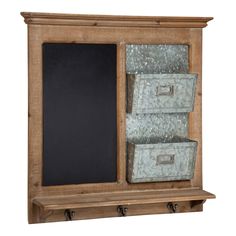 a wooden shelf with two baskets and a chalkboard