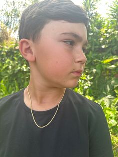 One of its kind! This delicate 2mm Rope Chain is the perfect necklace for your kid's everyday wear. Need a gift for Father's day or Mother's Day? Match your baby's necklace with an adult size.  Material: 18K Gold Filled. Our gold-filled pieces are bonded with 8 layers of real gold. This makes our jewelry high quality and long lasting and a great alternative to solid gold for a fraction of the price. Our pieces are 100% lead and nickel free making them hypoallergenic and a great option for those Boy Necklace, Boys Necklace, Baby Necklace, Godparent Gifts, Kids Line, God Parents, Alessandra Ambrosio, Vanessa Hudgens, Rope Necklace