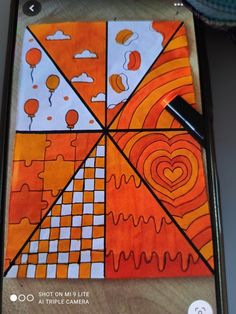 a cell phone with an abstract painting on it's screen and a pen in the middle