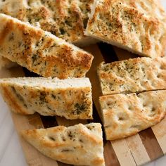 slices of garlic bread on a cutting board