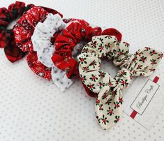 Beautiful Christmas bow scrunchie with smaller size bow / knot detail.  This fabric bow scrunchie is made from pretty Christmas Themed printed fabric (Holly, Stars, Christmas Stockings, Snowflakes and Tartan) Hair Scrunchies have made a brilliant revival recently and the bunny ears  bow/ knot detail is a super cute addition to the on trend hair scrunchie. A very easy to use hair accessory for a quick hair messy updo!   🌼COLOURS These pretty bow scrunchie hairbands come in many fabric prints. Pl Fabric Scrunchies, Bow Image, Bow Scrunchie, Tartan Accessories, Bow Hairband, Country Christmas Decorations, Scrunchie Hair, Christmas Bow, Pretty Christmas