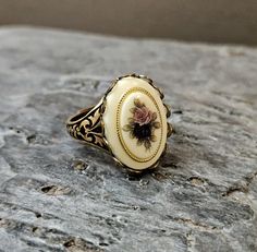 A gorgeous, vintage detailed cameo of a dusty pink rose with a pale yellow background set in detailed antiqued brass. Ring is antiqued brass with an adjustable, detailed band. Details: Ring measures approx 18x13mm Ring is plated brass Ring band is adjustable Lead and nickel free Cameo vintage glass Thank you for shopping Delicate Industry :) Jane Austen Jewelry, Gift Ideas For Mom, Jewelry Holiday, Ring Flower, Cameo Jewelry, Holiday Gift Ideas, Cameo Ring, Ring Antique, Brass Ring