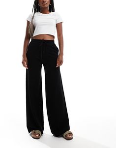 Pants & Leggings by Stradivarius Adding to bag in 3, 2, 1… High rise Elasticated drawstring waist Functional pockets Straight fit Black Sweatpants With Ribbed Waistband And Straight Hem, Black Straight Leg Elastane Sweatpants, Stradivarius Cargo Pants Black, Stradivarius Cargo Pants Grey, Black Wide-leg Pants With Drawstring, Knitted Trousers, Straight Leg Trousers, Knit Pants, Maxi Dress Trend