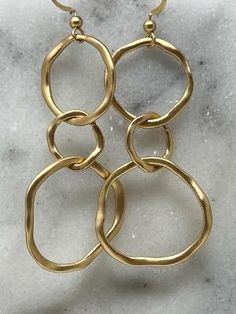 Gold Plated Triple Hoop Earrings Swara Jewelry Gold-tone Metal Circle Hoop Earrings, Chic Gold Hammered Hoop Earrings, Chic Gold Circle Hoop Earrings, Gold Open Circle Hoop Earrings, Gold Nickel-free Open Circle Hoop Earrings, Triple Hoop Earrings, Handmade Gold, Matte Gold, Gold Bracelet