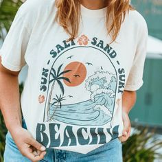 Beachy Tee | Shop Mountain Moverz T-Shirts Trendy Cream Summer T-shirt, White Screen Print T-shirt For Summer, Beige Letter Print T-shirt For Spring, Trendy Beige Relaxed Fit T-shirt, Casual Cream Short Sleeve T-shirt, Casual Beige Graphic Print Shirt, Casual Beige Shirt With Graphic Print, Everyday Summer Cream Shirt, Cream T-shirt With Relaxed Fit And Short Sleeves