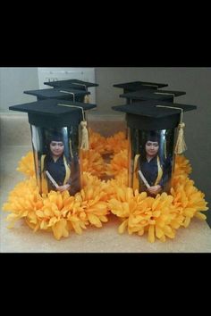 graduation decorations made to look like they have been placed on top of each other with flowers